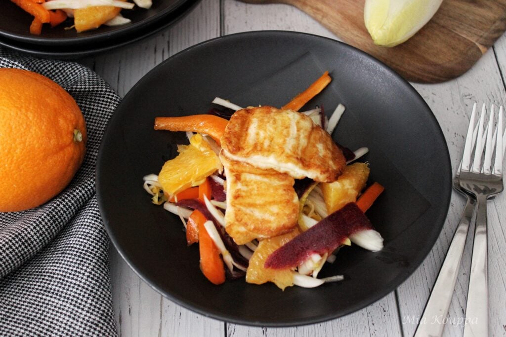 Citrus salad with fried halloumi