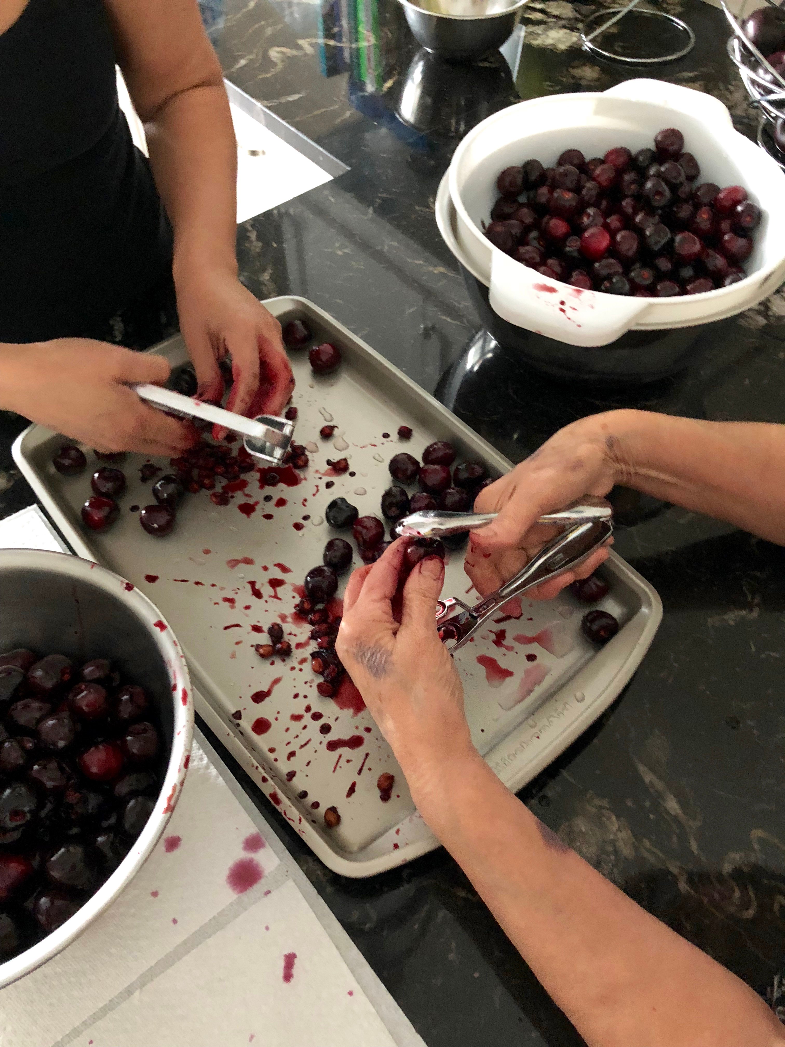 Pitting cherries... Cherry pitter is a great idea!