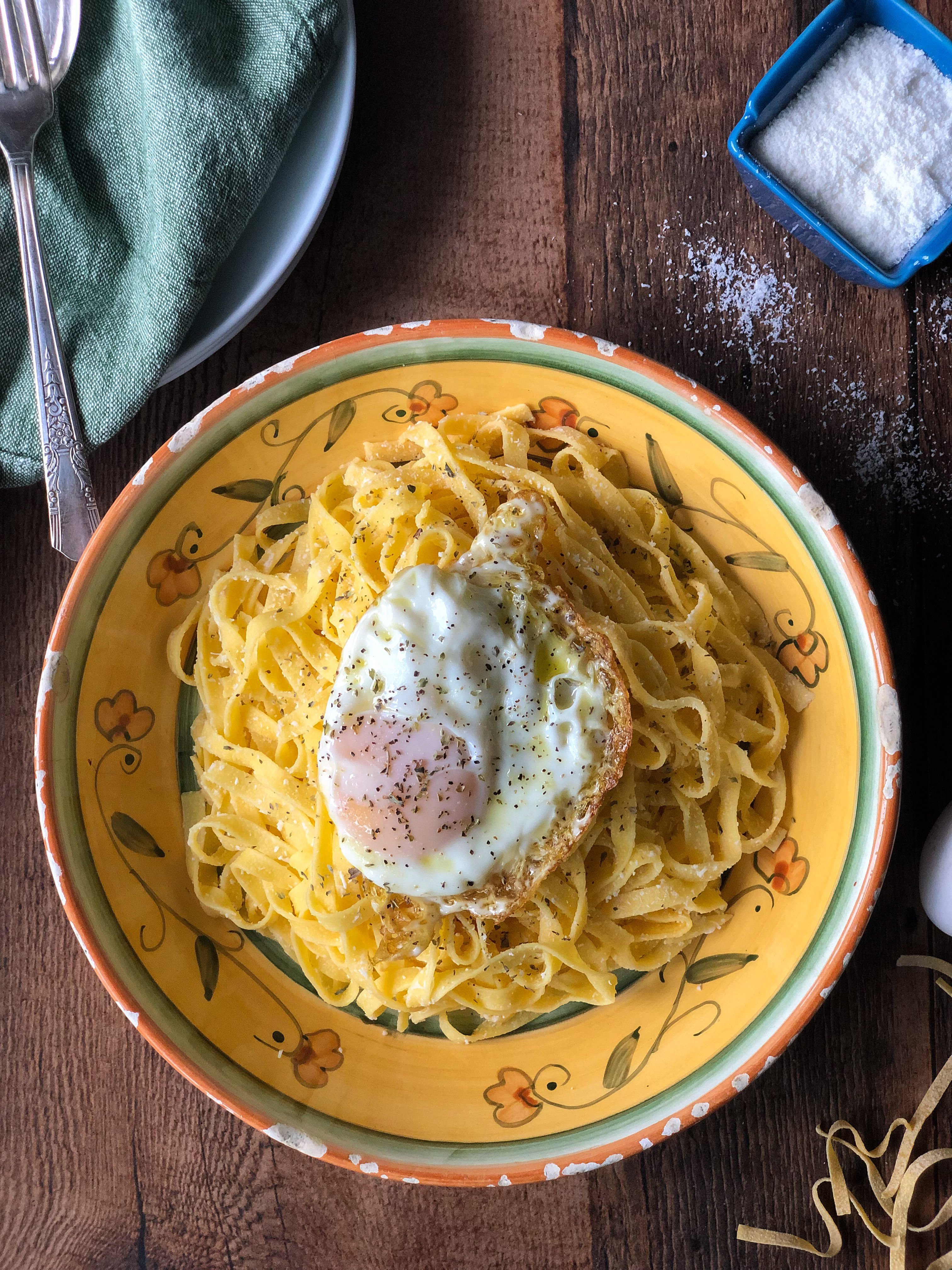 Pasta topped with fried egg
