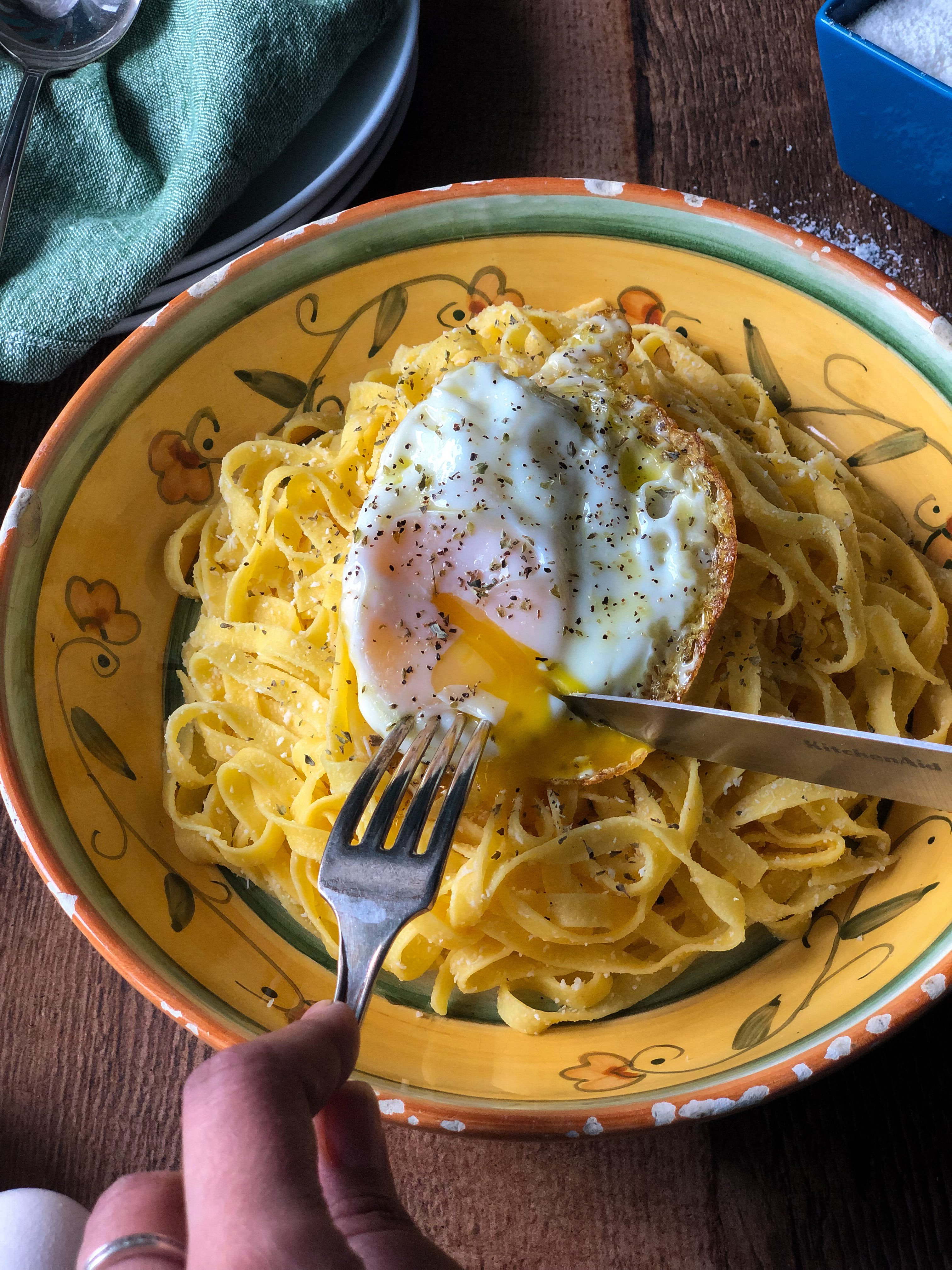 Pasta topped with fried egg