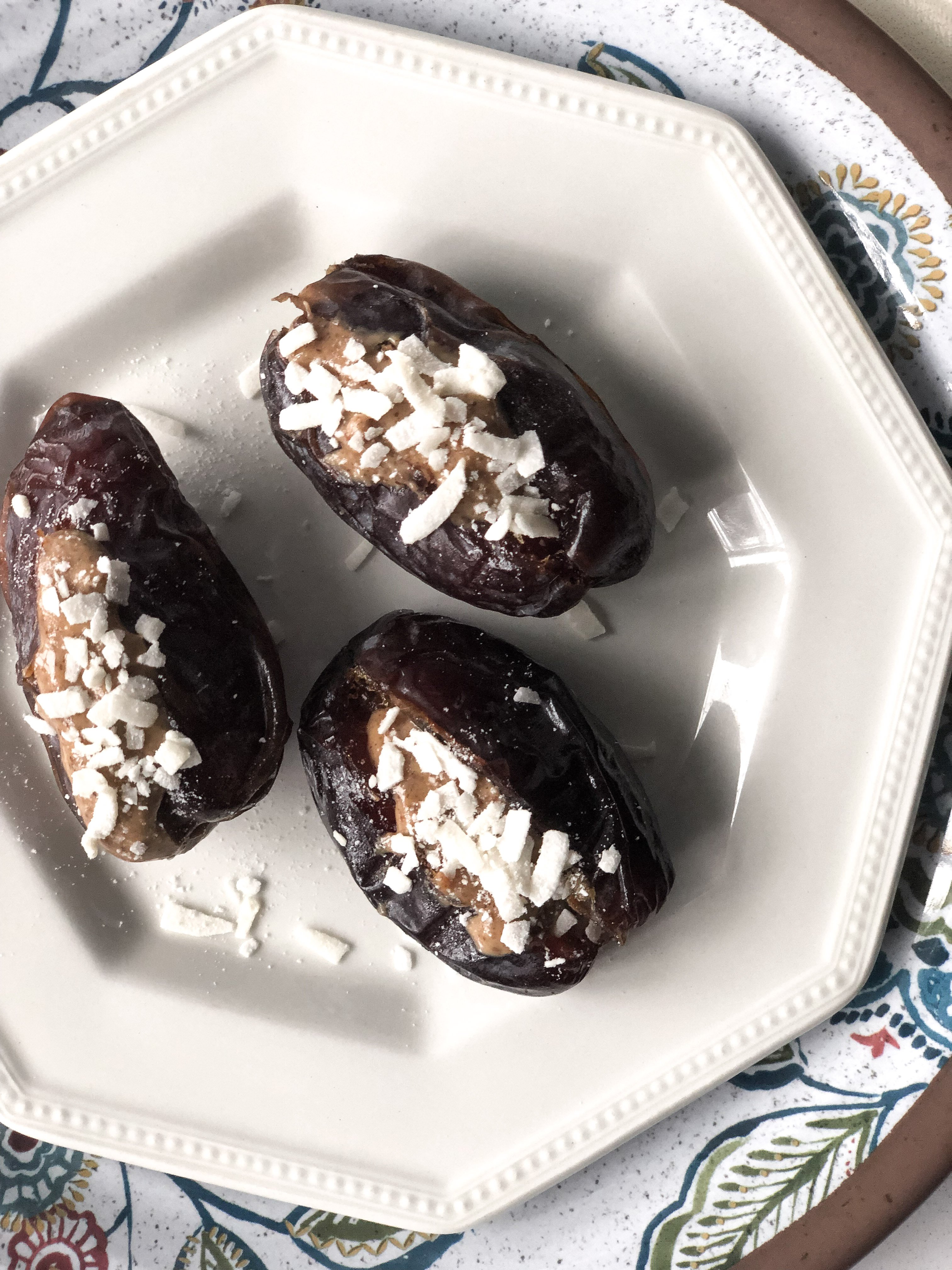 Dates stuffed with almond butter and coconut