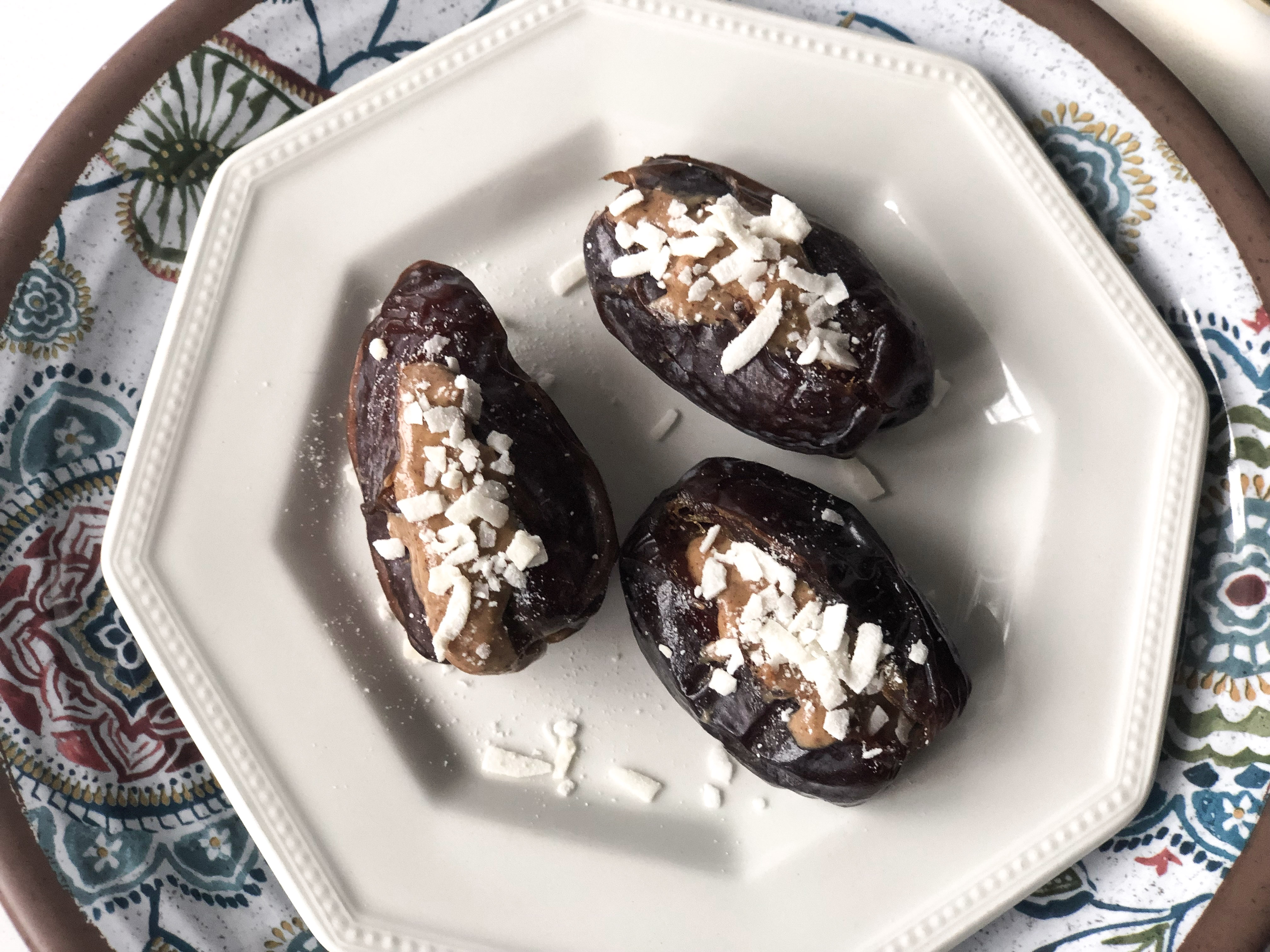 Dates stuffed with almond butter and coconut