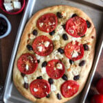 Focaccia with tomatoes, olives and feta