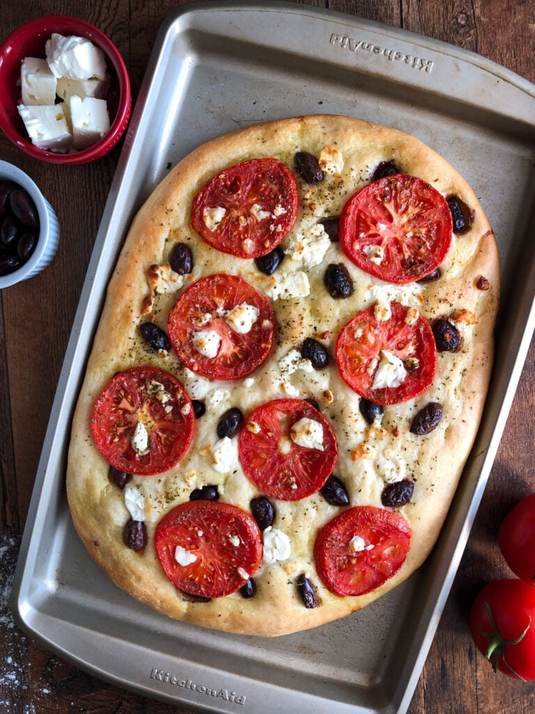 Focaccia with tomatoes, olives and feta