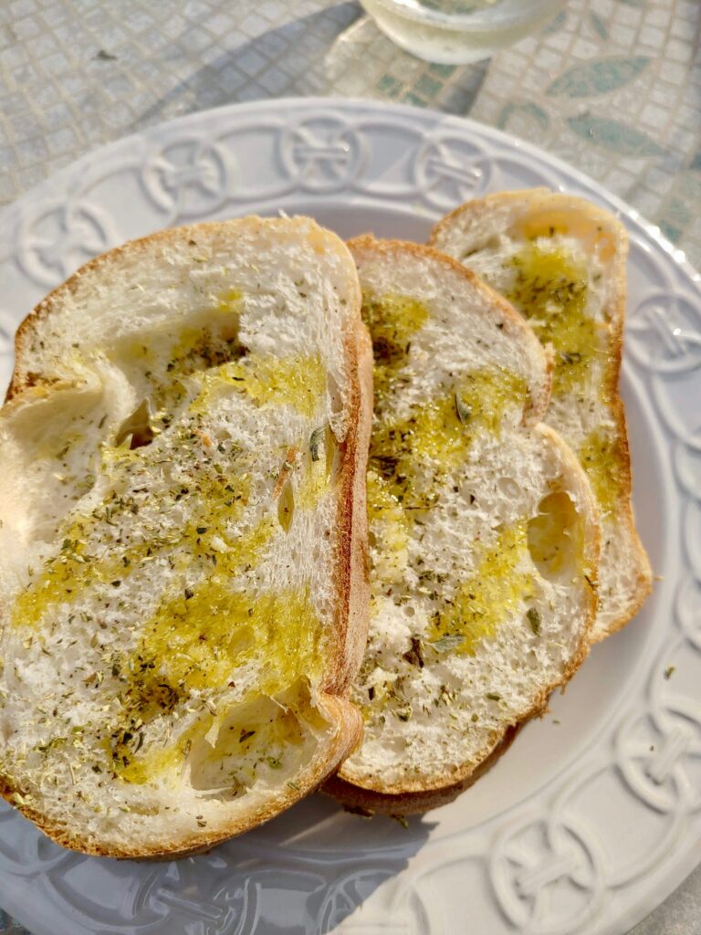 Grilled bread with olive oil and oregano