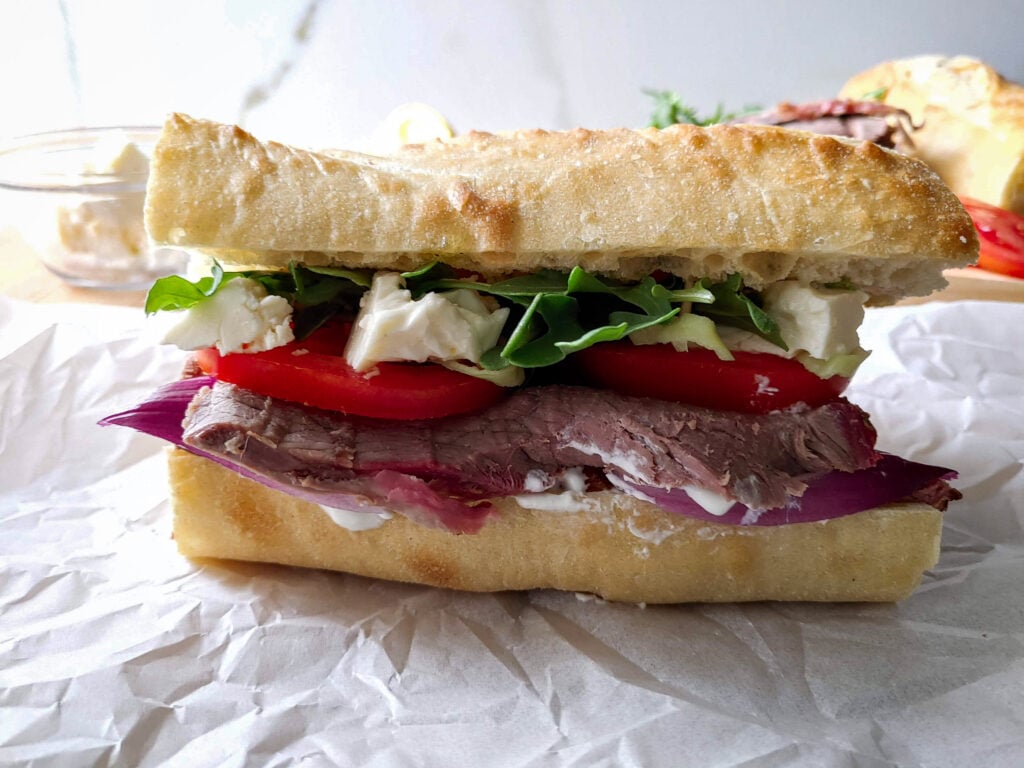 A delicious Greek lamb sandwich full of Mediterranean flavours