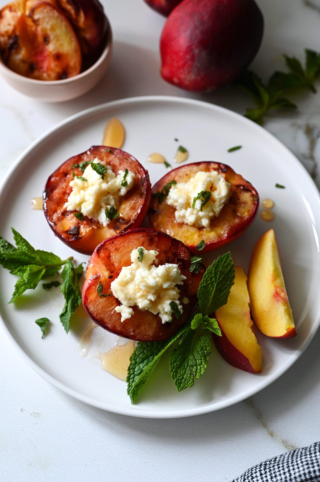 Grilled peaches with feta and honey Mia Kouppa