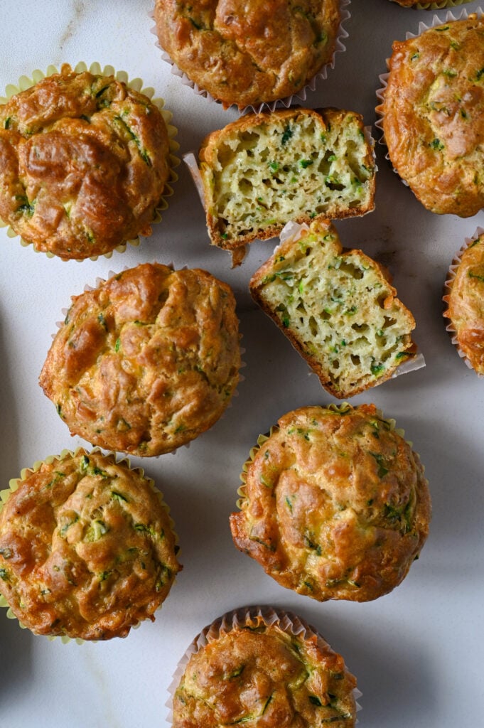 Savoury zucchini and cheddar muffins made with summer squash, aged cheddar and fresh herbs