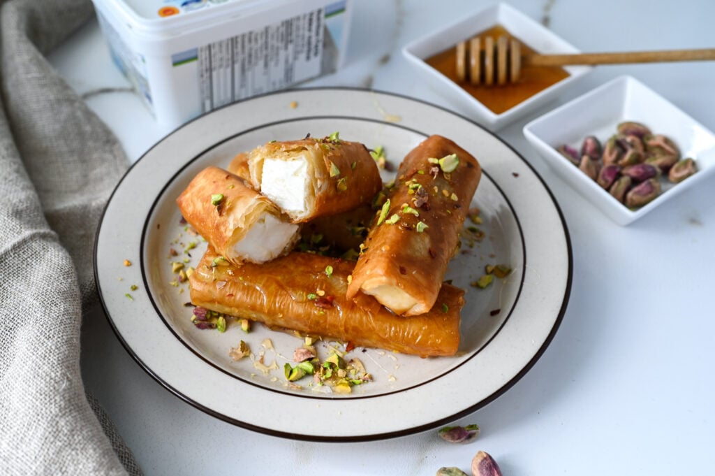Fried phyllo wrapped feta with chili flakes, honey and crushed pistachios.