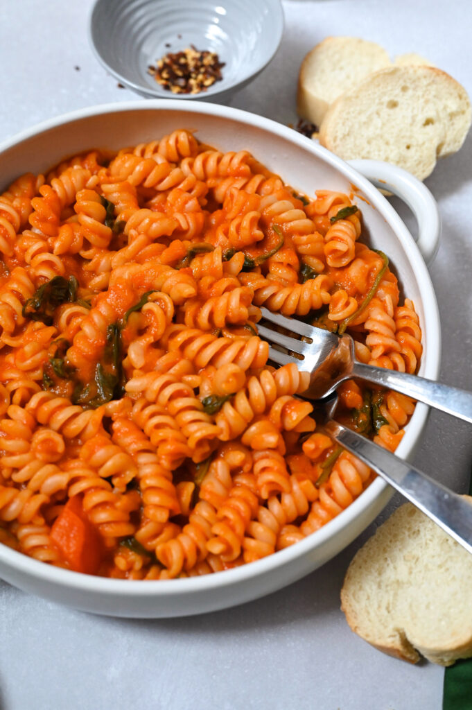 An easy pasta recipe with a smooth and spicy tomato and red pepper sauce