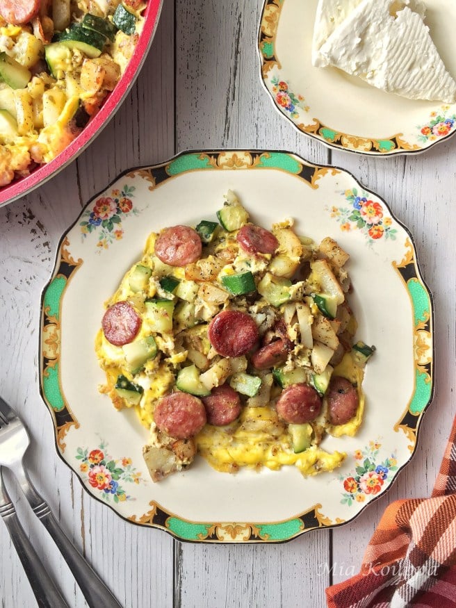 Eggs with loukaniko and potato