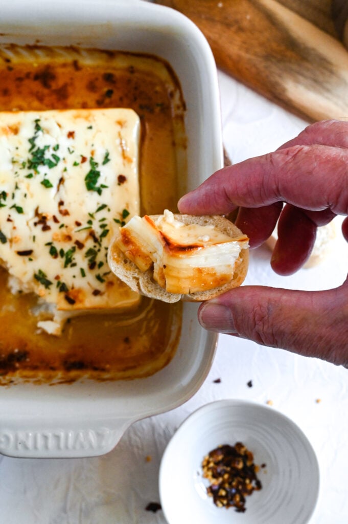 Baked feta with honey is a simple and delicious meze, perfect with crackers or bread.