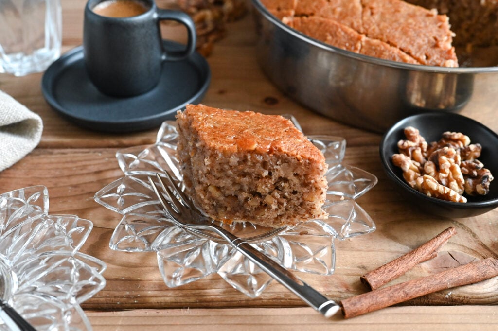 A traditional syrup cake full of walnuts and spices