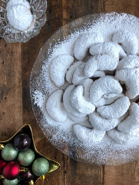 Kourabiethes (kourabiedes) are a Greek almond shortbread type cookie that is coated in icing sugar.