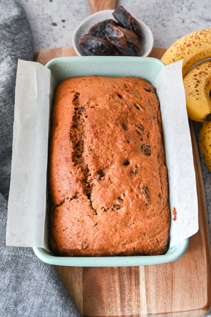 A healthy and vegan banana bread made with dates and sweetened with molasses
