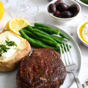 Learn how to make the best pan-seared and roasted filet mignon with herbed butter baste