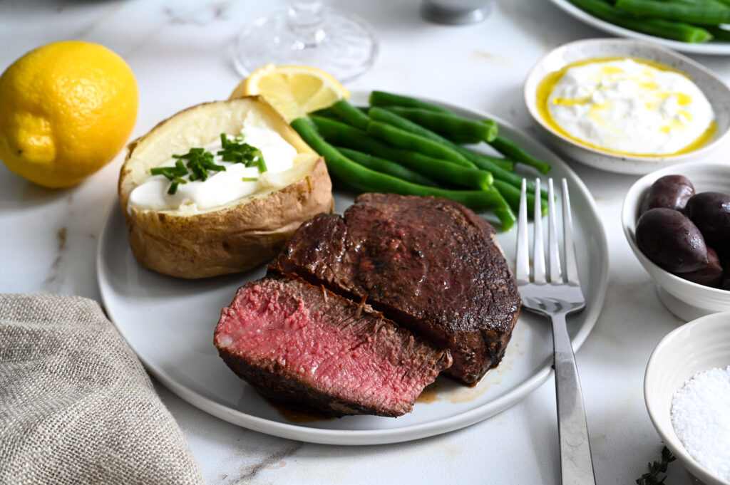 Learn how to make the best pan-seared and roasted filet mignon with herbed butter baste.