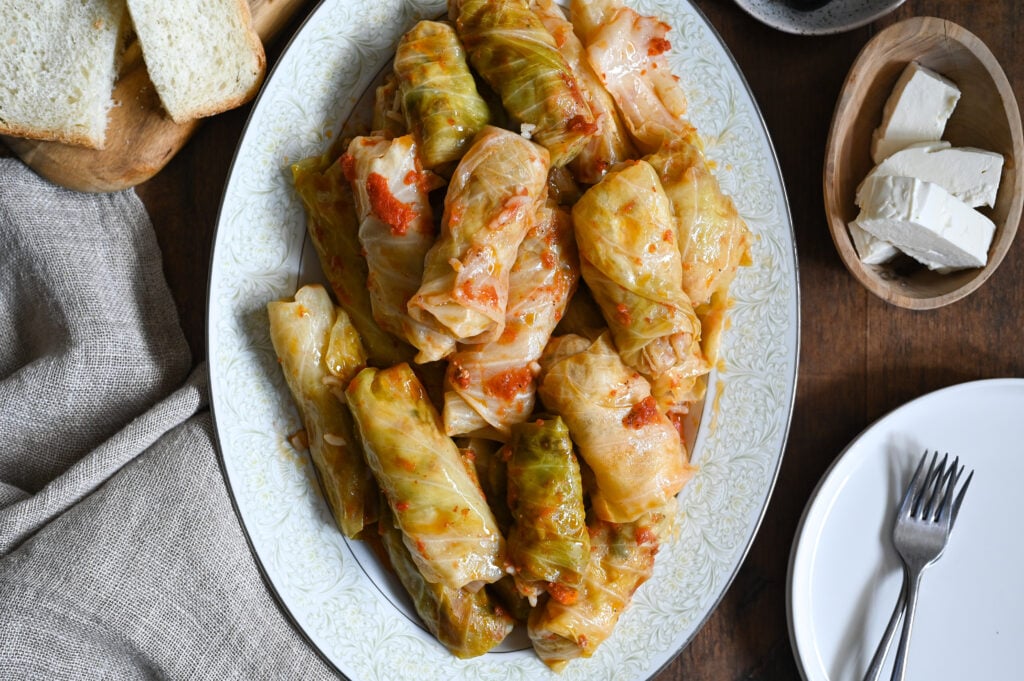 Lahanodolmades, Greek stuffed cabbage rolls with tomato sauce.