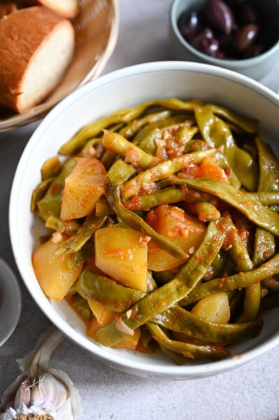 Vegan Greek green bean stew with potatoes and tomato.