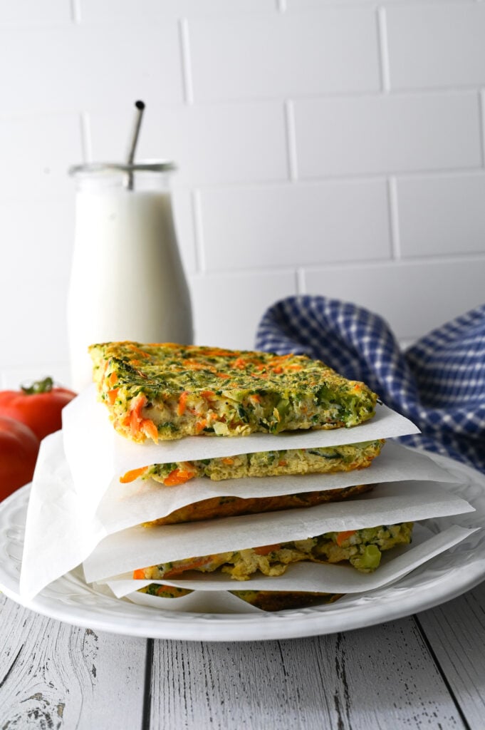 A wonderful make ahead breakfast of easy sheet pan eggs full of vegetables for the most delicious and convenient breakfast sandwich.