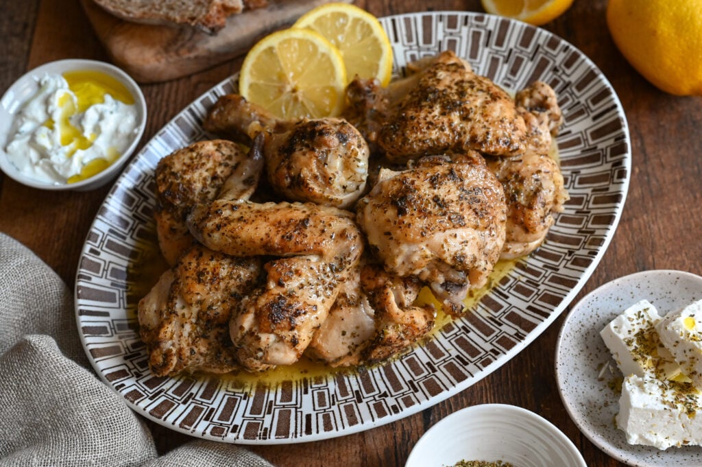 Kota riganati is a rustic Greek recipe of chicken served with plenty of lemon and oregano.