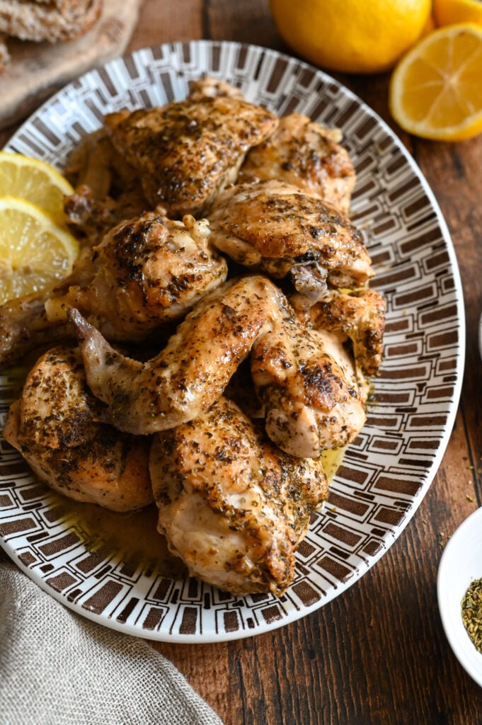 Kota riganati is a rustic Greek recipe of chicken served with plenty of lemon and oregano.