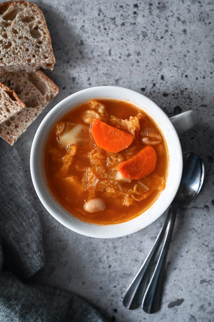 An easy and healthy cabbage and bean vegetable soup recipe.