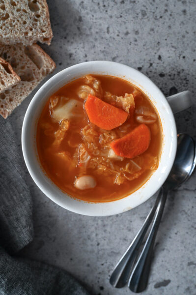 An easy and healthy cabbage and bean vegetable soup recipe.