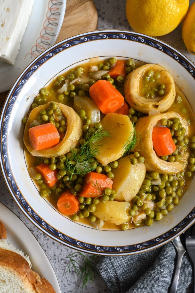 Aginares à la polita is a traditional vegan Greek artichoke stew.