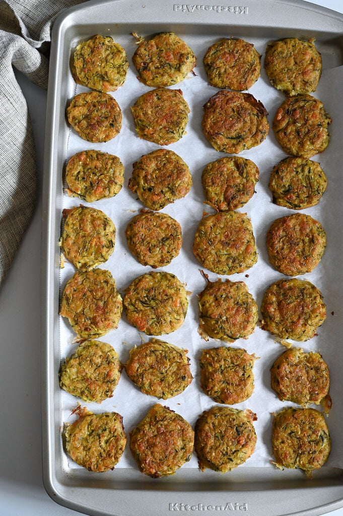 Kolokithokeftedes or Greek zucchini fritters made with feta and baked for a light snack or side.