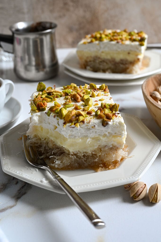 Greek Ekmek Kataifi - Custard and whipped topping dessert with syrup soaked pastry