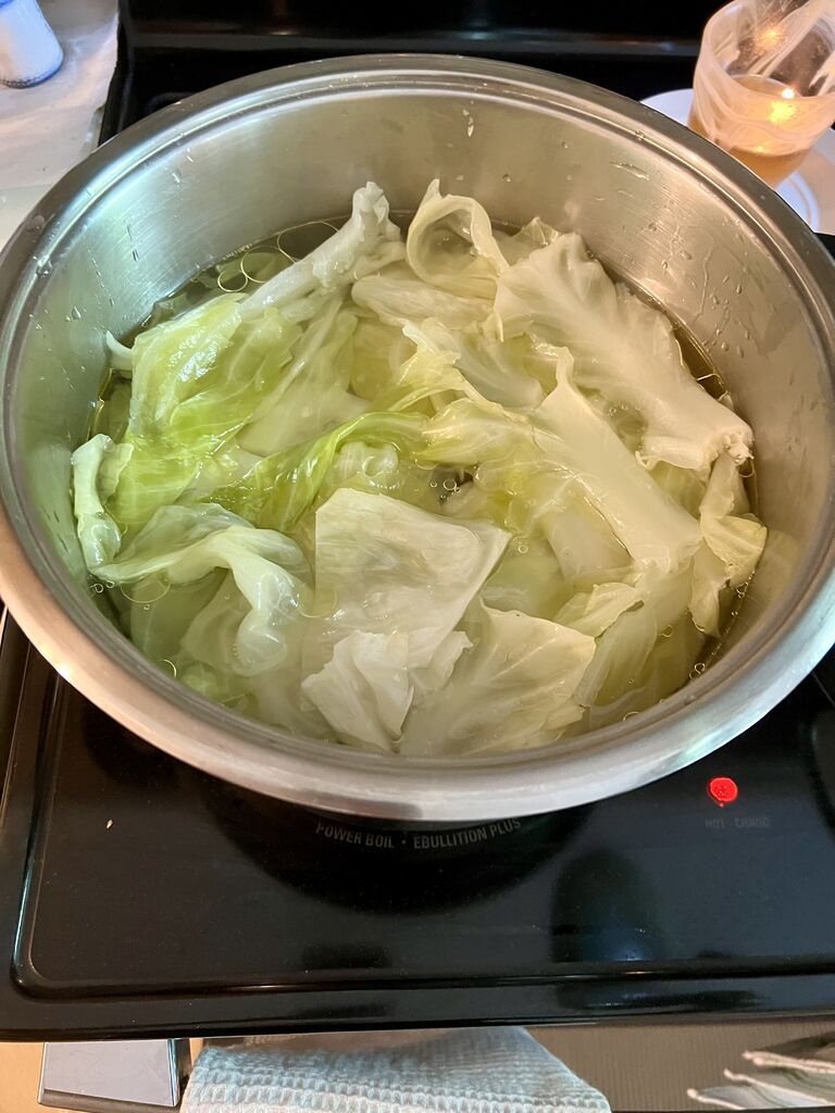 Greek cabbage rolls (lahanodolmades) with zucchini and rice