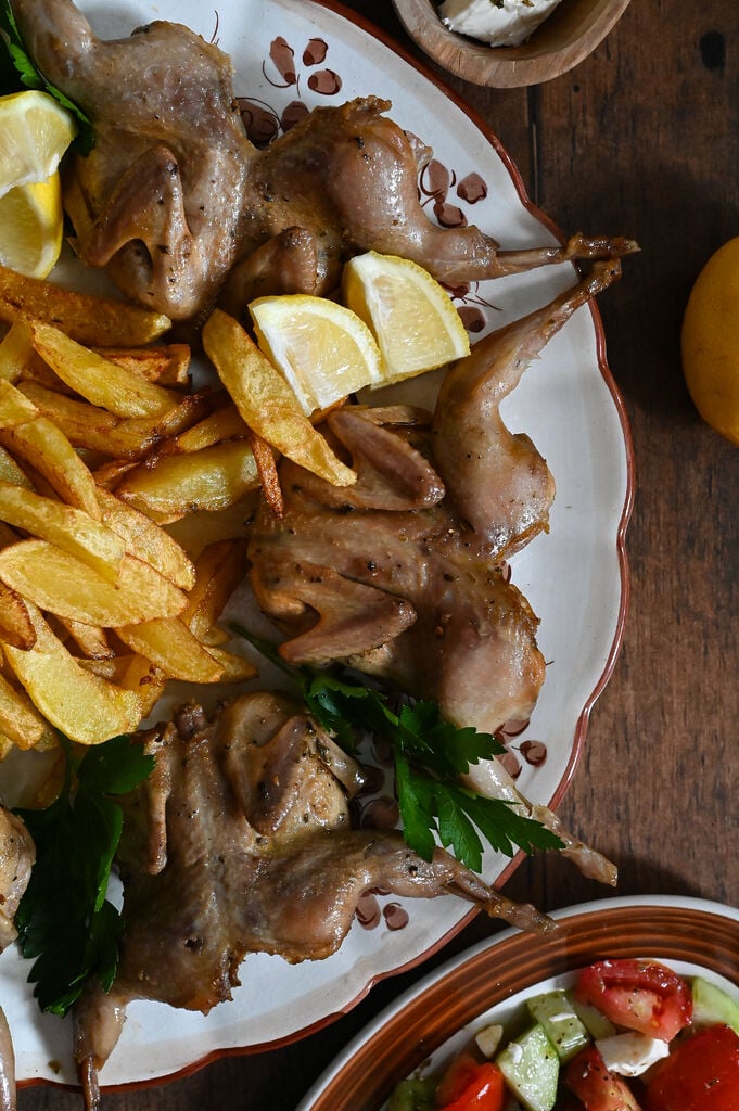 Fried quails with French fries