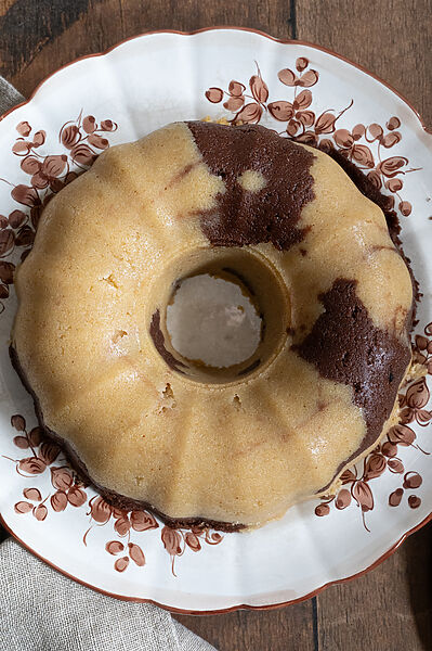 halva on a white platter with brown trimming