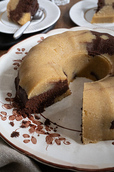 halva on a white platter with brown trimming