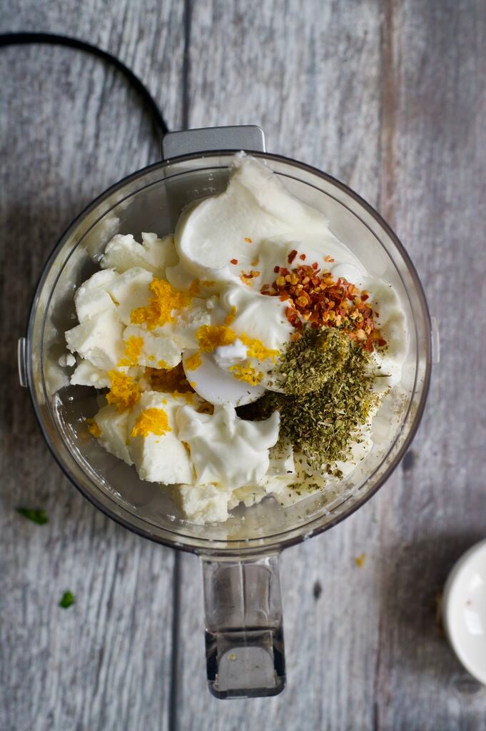 The ingredients for whipped feta dip, in mini food processor
