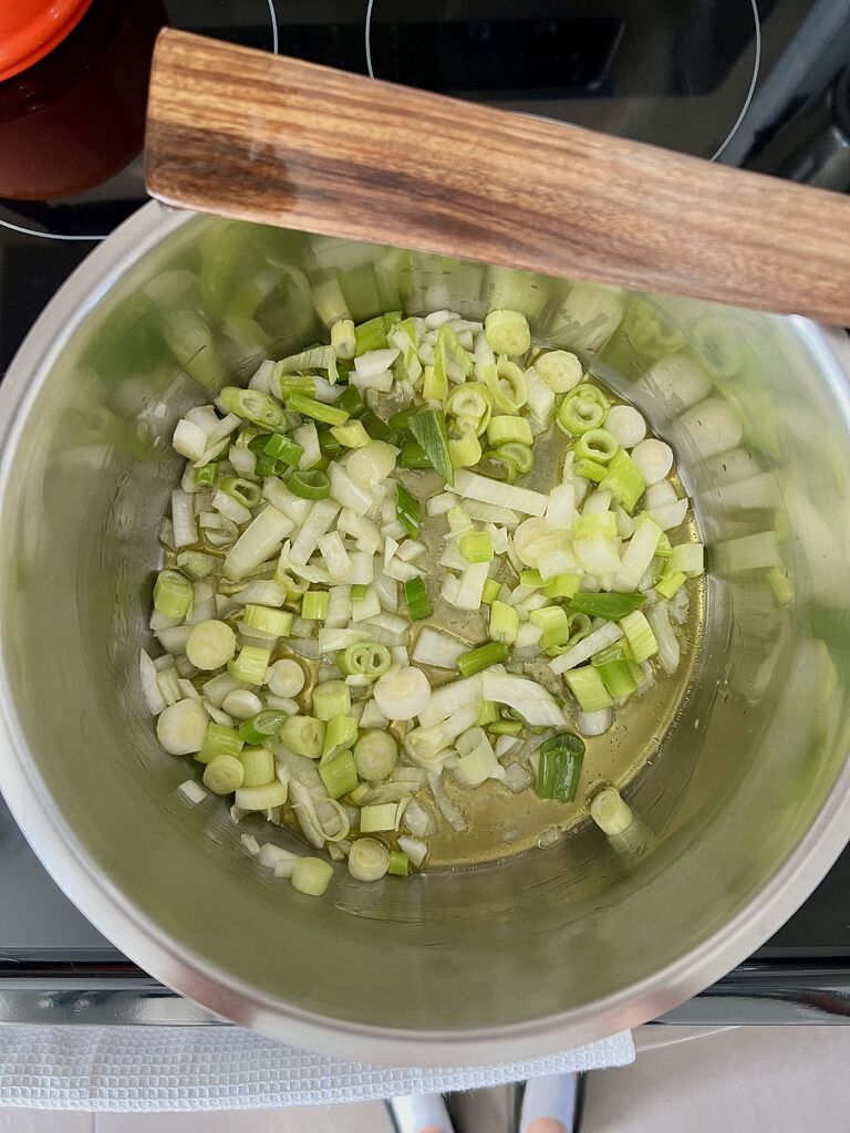 Cooking of the spinach and potato stew.