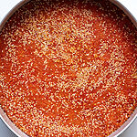 The baked Karpouzopita in a stainless steel baking pan.