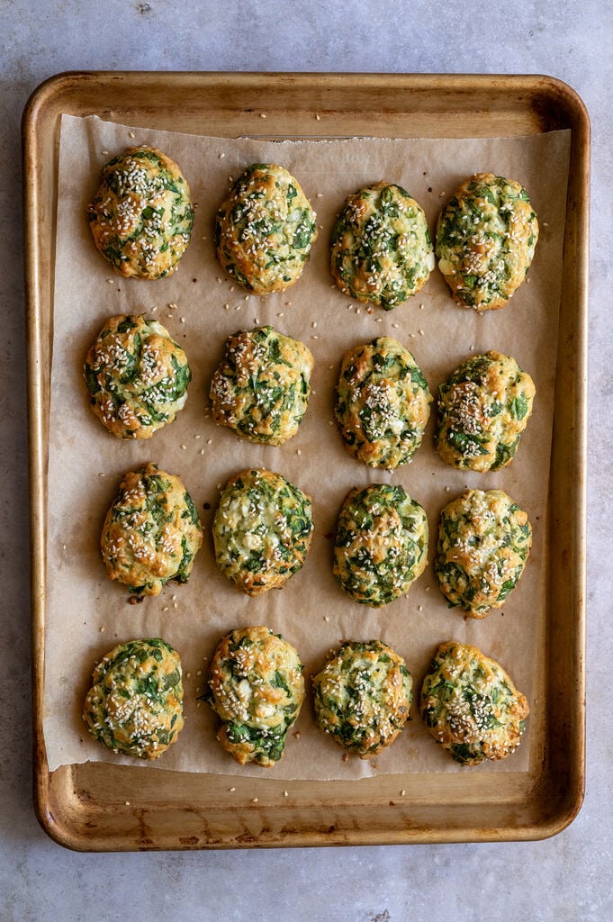 Greek Spanakotiropitakia (spinach and cheese pita) without phyllo, just baked on a baking sheet.