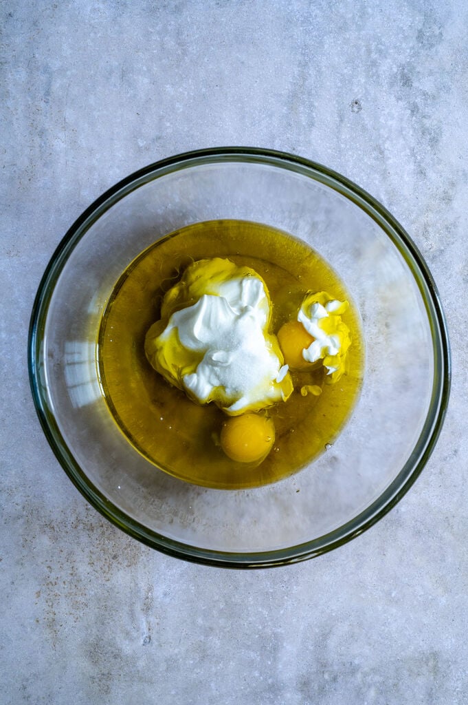 Eggs, Greek yoghurt and Olive oil in a bowl.