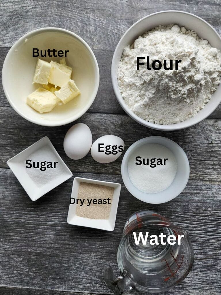 Ingredients that include butter, flour, eggs, sugar, water and dry yeast.