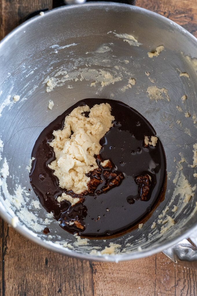 Mixing the white dough into the chocolate.