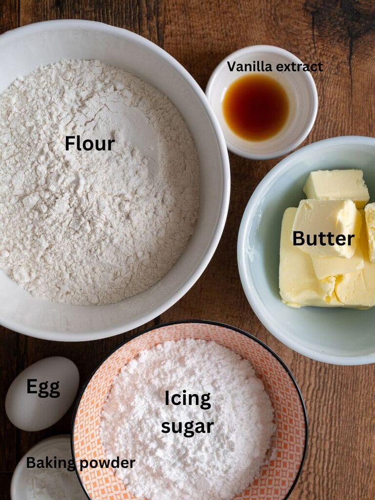 Ingredients for the cookies: Flour, vanilla extract, butter, egg, baking powder and icing sugar.