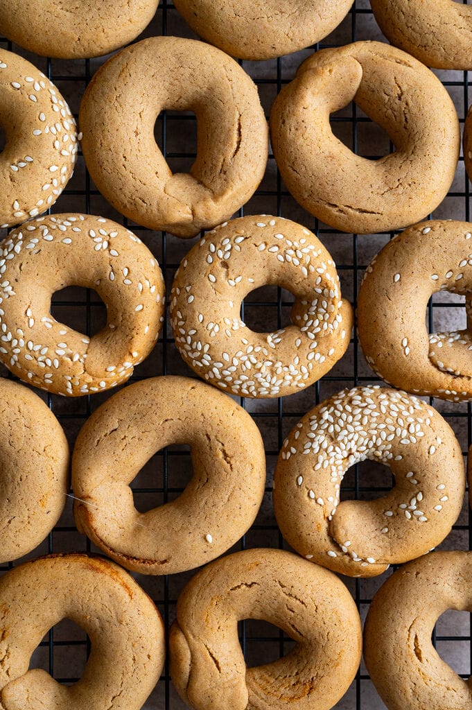 Greek moustokouloura cookies (Grape must cookies with petimezi) on a baking tray.