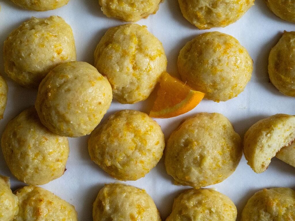 Orange ricotta cookies on a tray