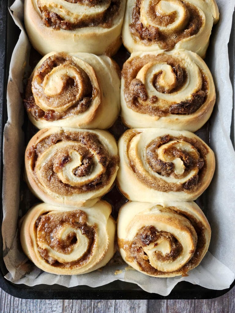 Sticky toffee cinnamon buns with dates baked and ready to enjoy.