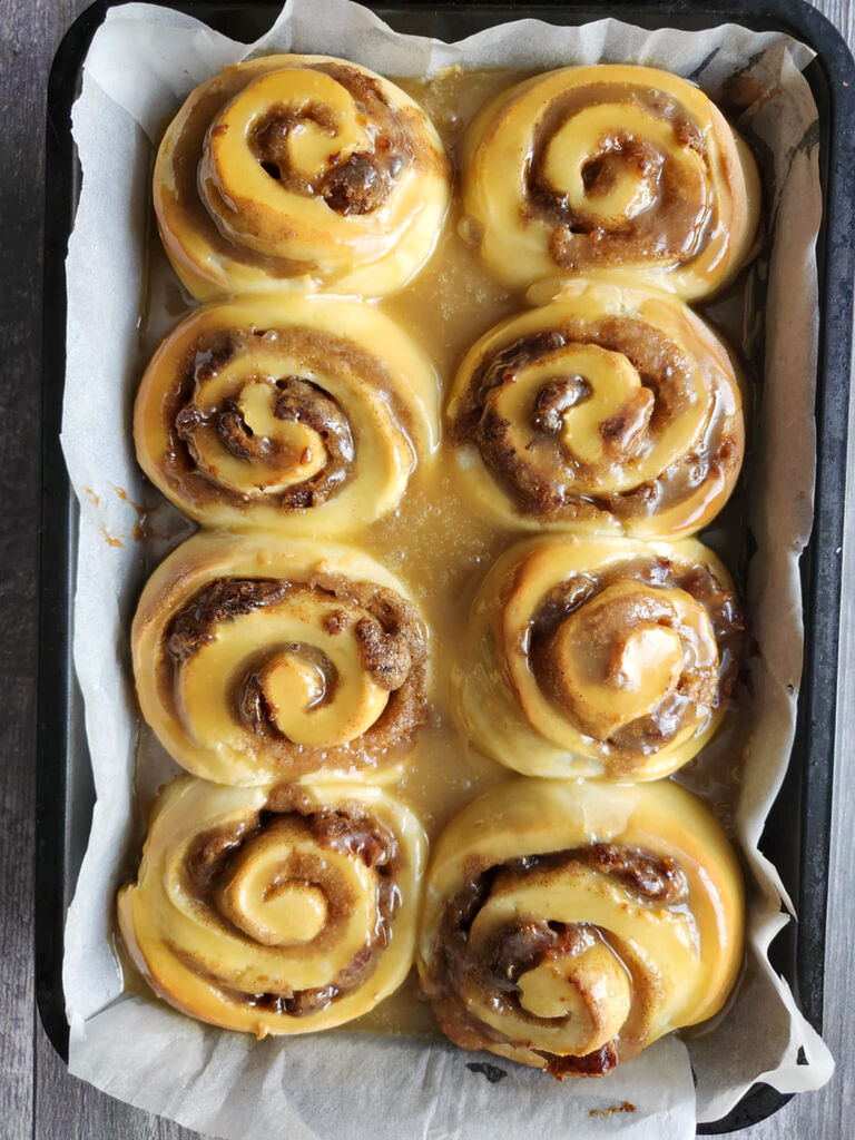 Sticky toffee cinnamon buns with dates baked and ready to enjoy.