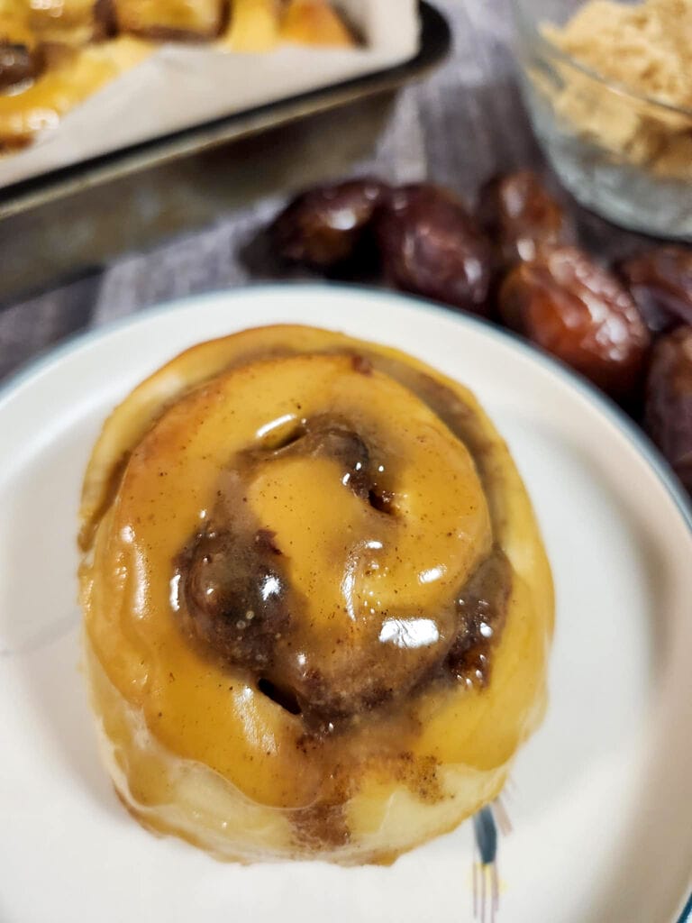 Sticky toffee cinnamon buns with dates baked and ready to enjoy.