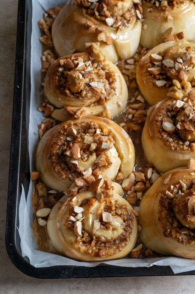 The baklava cinnamon rolls pictured in the baking pan.