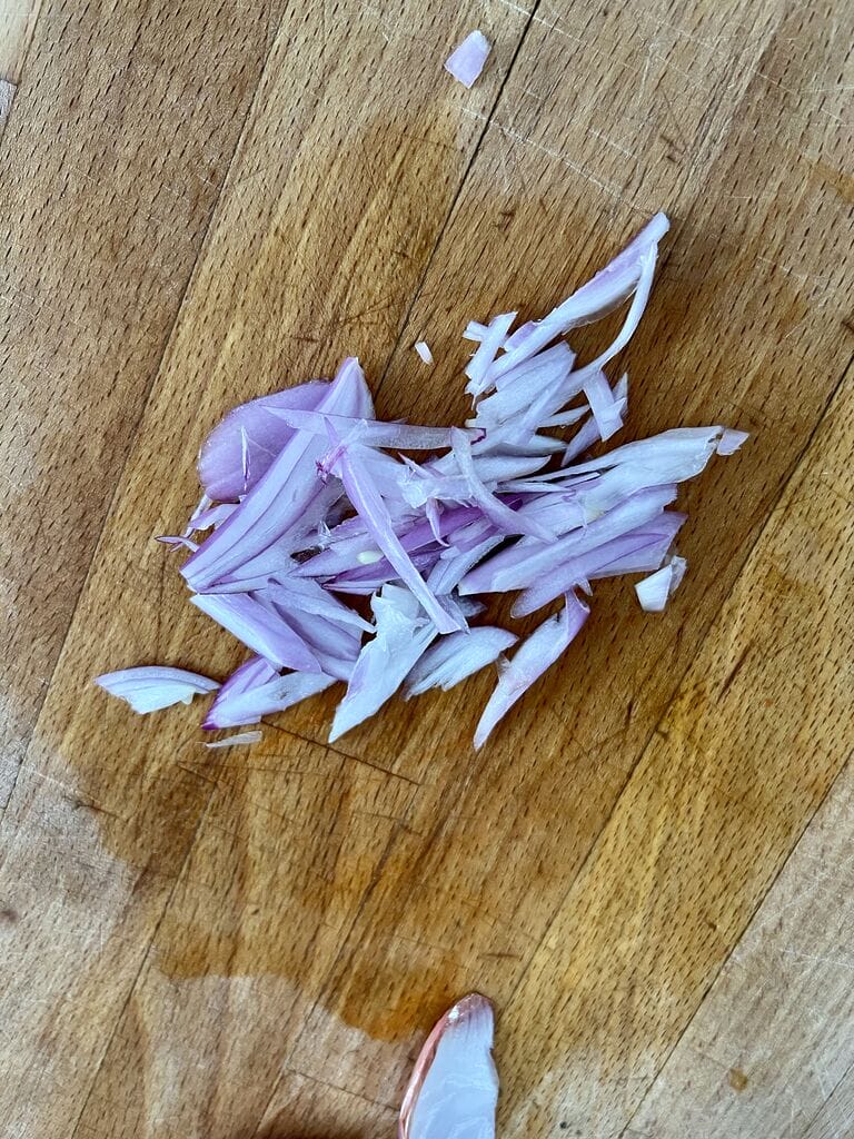 Slivered red onions.